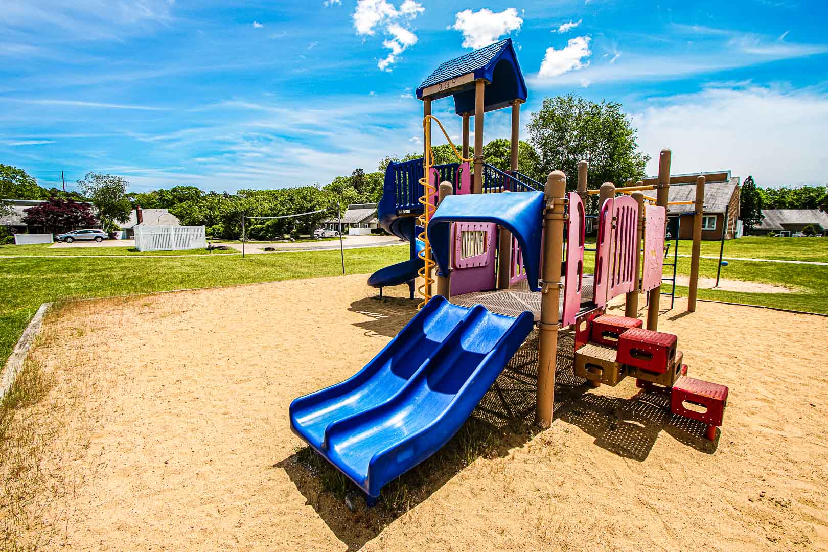 An enjoyable outdoor kids playground at VRI's Brewster Green Resort in Massachusetts.